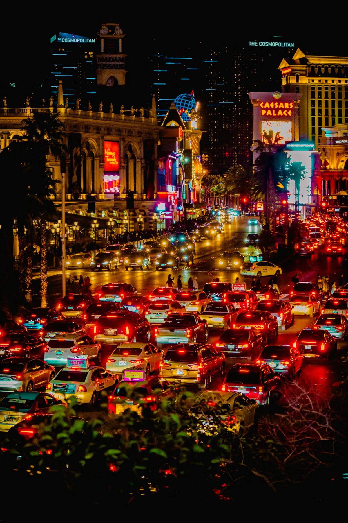 A bunch of cars stop at a traffic light on the Strip in Las Vegas