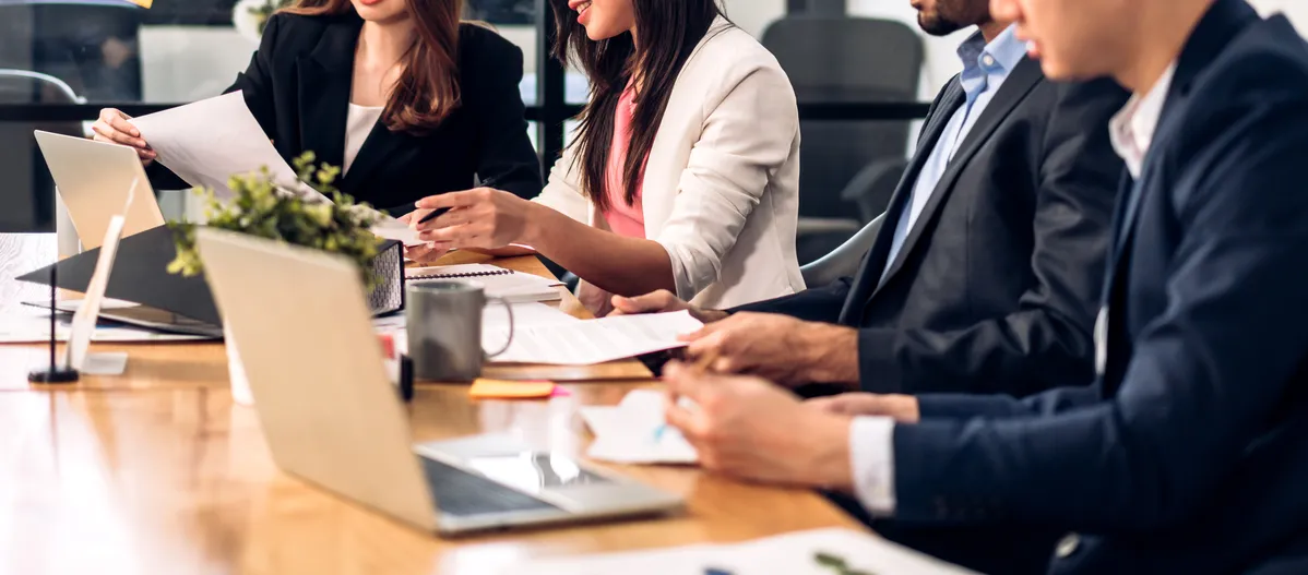 A group of people in a mediation session for a personal injury claim