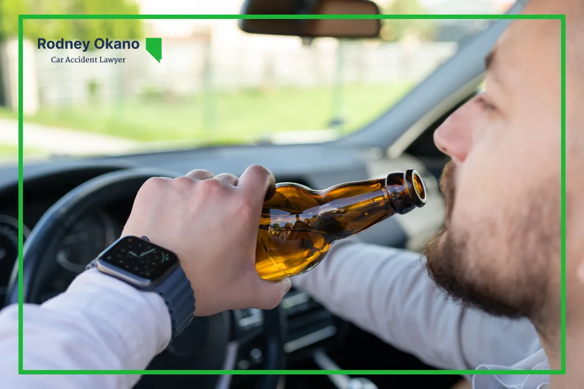 Image of a man drinking at the wheel to represent how common drunk driving accidents are in Las Vegas