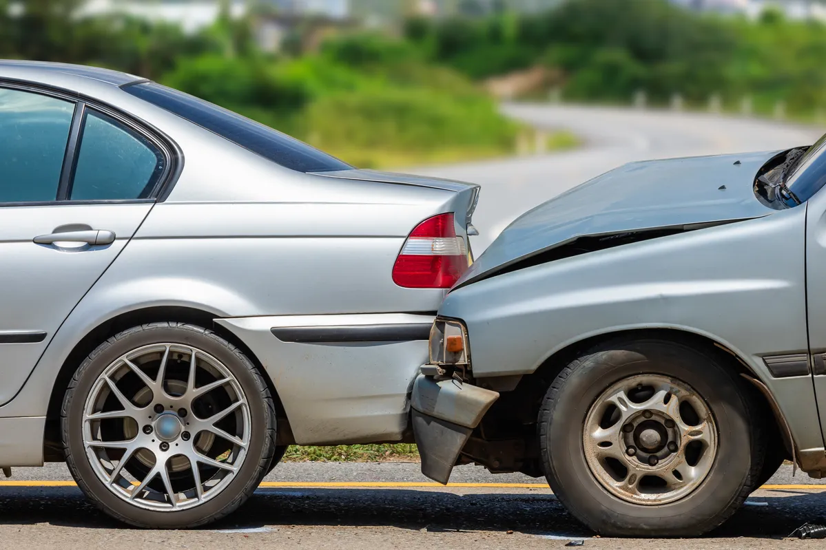 Image of a rear-end accident meant to be a representation of the steps to take immediately after a rear-end crash.