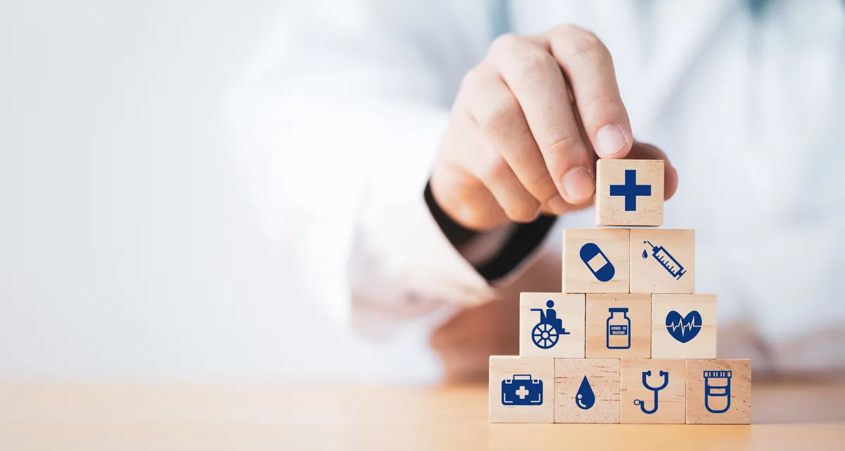 Image of medical icons on blocks to represent the costs of care after a car accident.