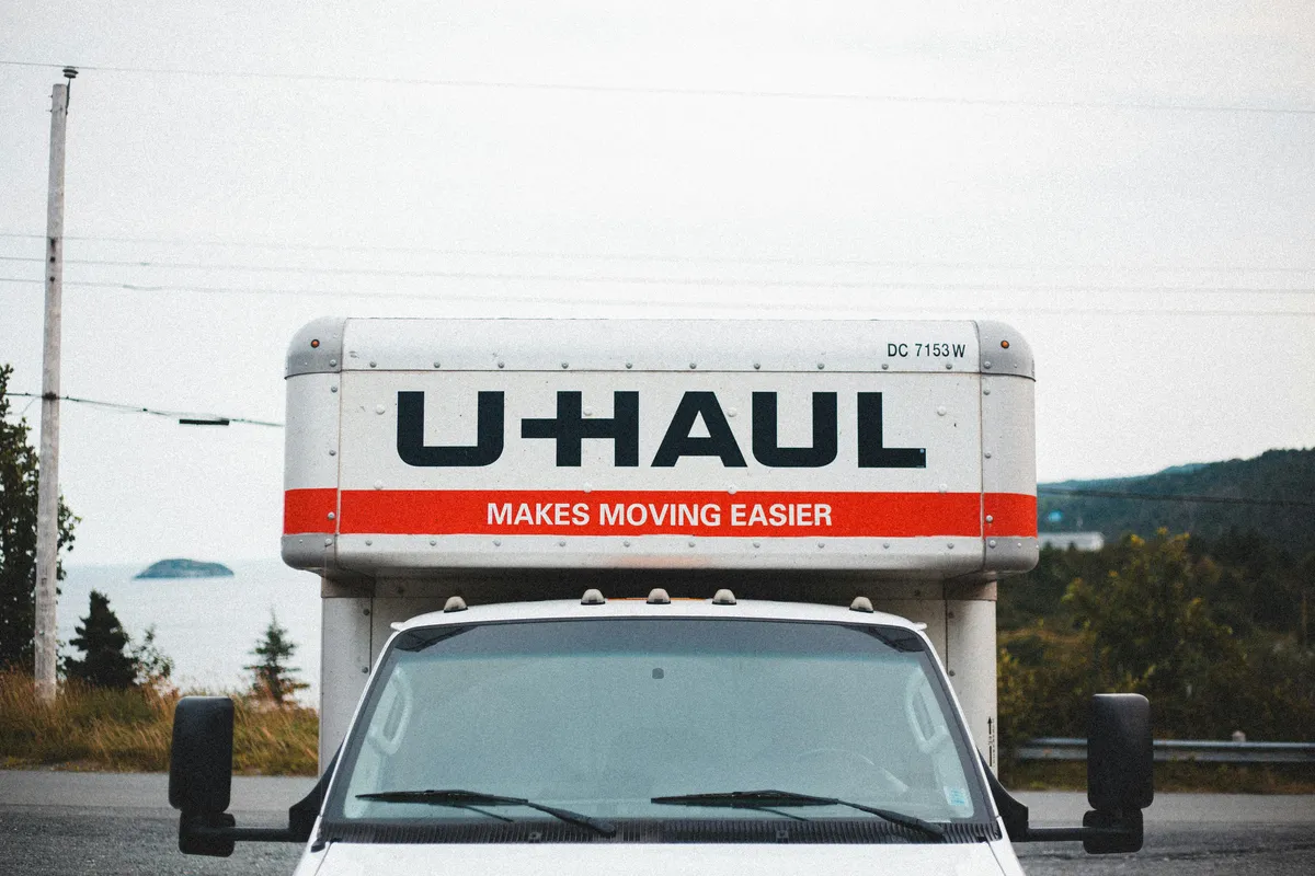  a truck that is parked on the side of the road