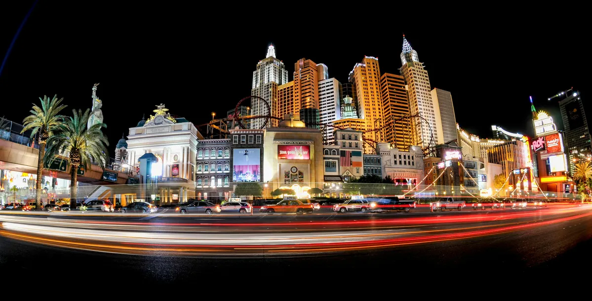  of a city street with a lot of buildings and cars